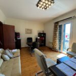 Spacious interior room with large windows in commercial space for sale near Corfu city center