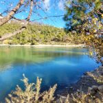 Scenic shot of Lake Beletsi surrounded by trees and nature trails.