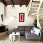 Cozy fireplace in the lounge area, enhancing the traditional charm of the renovated house in Gastouri, Corfu