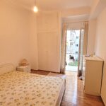 Bright bedroom with double bed in 1st floor Athens apartment for sale