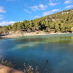 Scenic shot of Lake Beletsi surrounded by trees and nature trails.