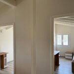 Renovated interior of a 3-bedroom house in Alepou, Corfu, with bright and airy living spaces.