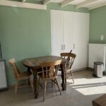 Renovated interior of a 3-bedroom house in Alepou, Corfu, with bright and airy living spaces.