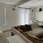 Cozy dining area in a 110 sq.m. detached house in Alepou, Corfu, with natural light and modern design.