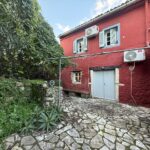 Exterior view of the detached house in Kato Korakiana, Corfu, showcasing its traditional architecture