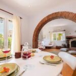 Open-plan living area filled with natural light, highlighting the cozy ambiance.