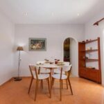 Bright and welcoming living room with comfortable seating and traditional decor.