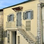 Traditional Corfiot house facade with stone details