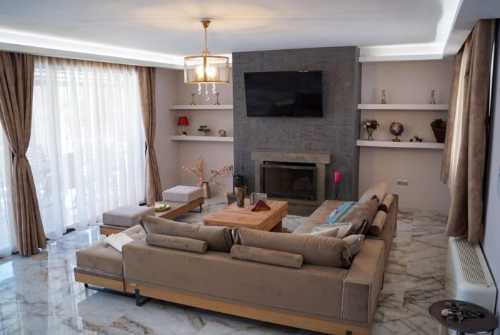Cozy lounge area with fireplace for relaxed living in Corfu