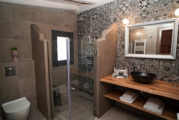 Stylish bathroom with modern fixtures in villa near Corfu