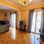 Bright living room with balcony in central Corfu Town apartment