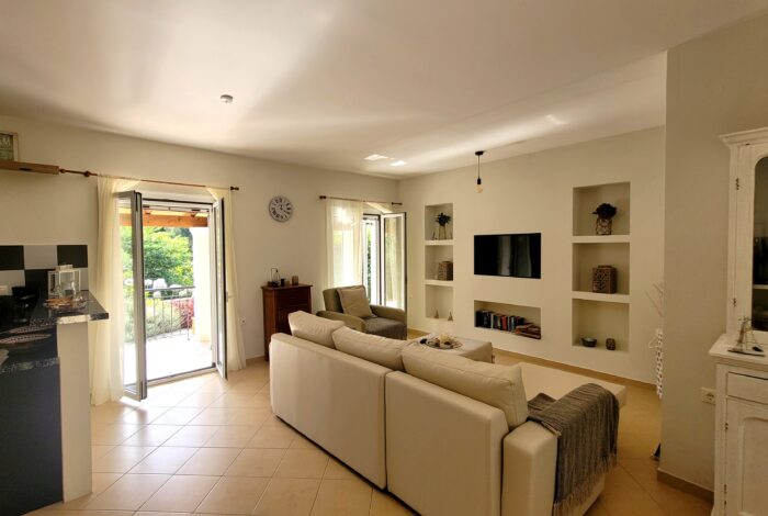 Comfortable living space with air conditioning and modern furnishings in Corfu villa