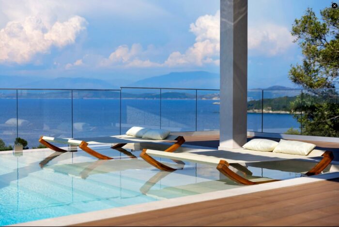 Secluded outdoor relaxation zone with sun loungers