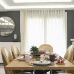 Elegant dining area adjacent to kitchen and lounge