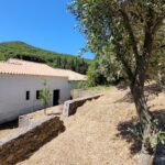 Exterior view of stone house built in 1978 in Skripero, Central Corfu
