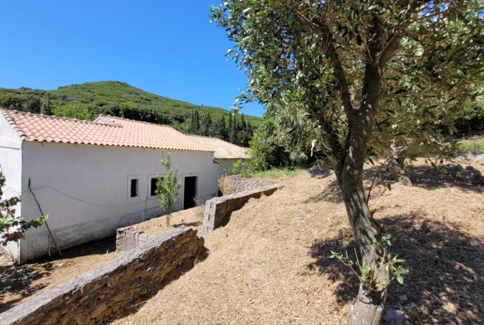 Exterior view of stone house built in 1978 in Skripero, Central Corfu