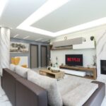 Spacious open-plan living room with energy fireplace