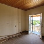 Unfinished apartment interior with natural light – renovation project in Agios Georgios, Corfu