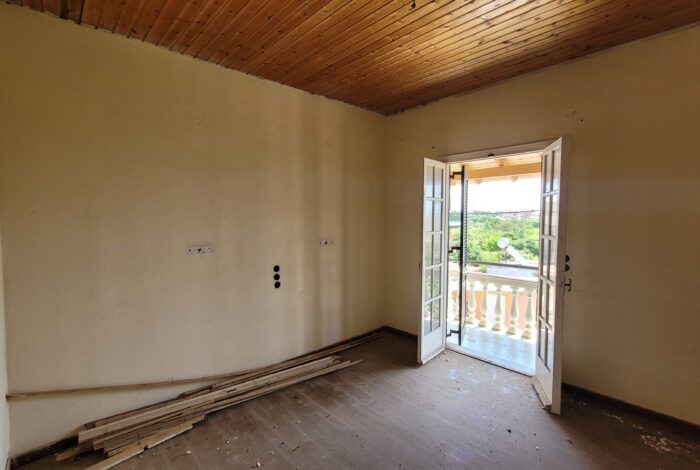 Unfinished apartment interior with natural light – renovation project in Agios Georgios, Corfu