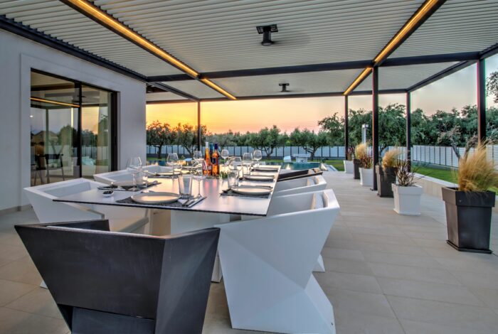 Outside dining area next to the swimming pool