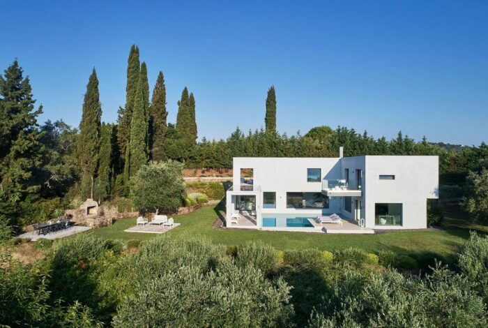 Luxury Corfu villa for sale with modern finishes and private outdoor spaces