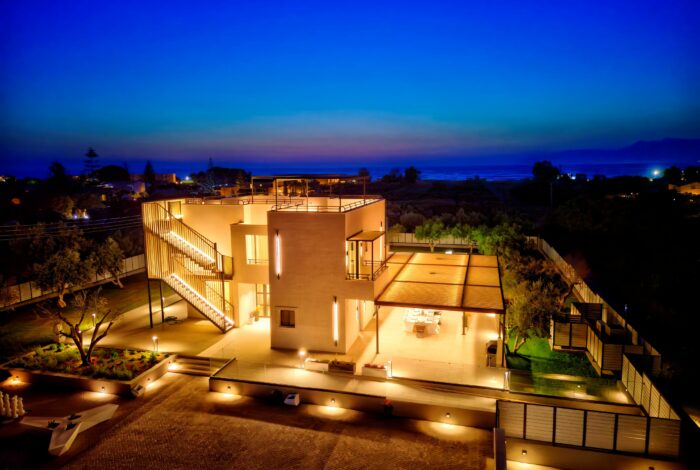 Scenic sunset view of North Corfu coastline from private villa for sale
