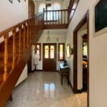 Ground floor space with internal staircase leading to the first floor