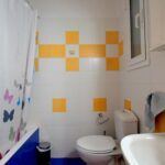 Bathroom with modern fixtures – renovated apartment in central Athens