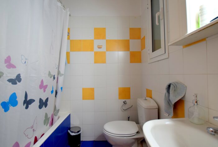 Bathroom with modern fixtures – renovated apartment in central Athens