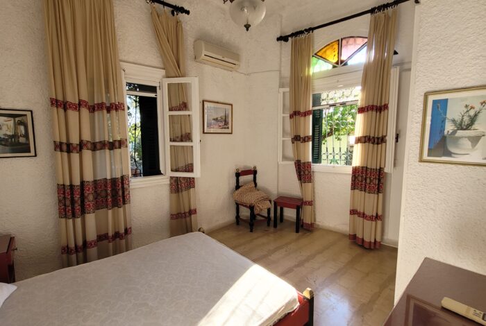 Bright bedroom with garden views in Building A, Kontogialos