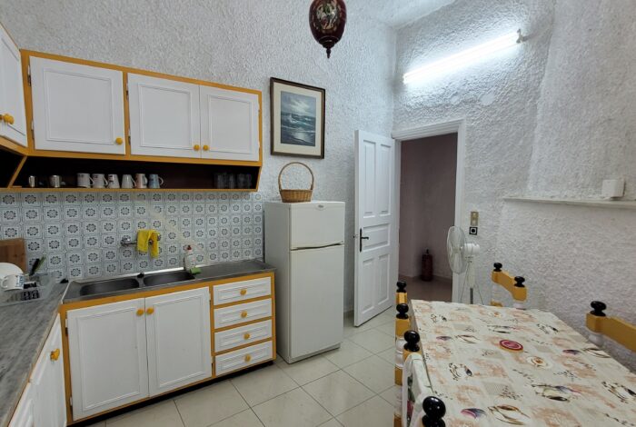 Spacious kitchen and dining area in Building B house