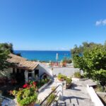 West-facing view towards Kontogialos beach from upper terrace
