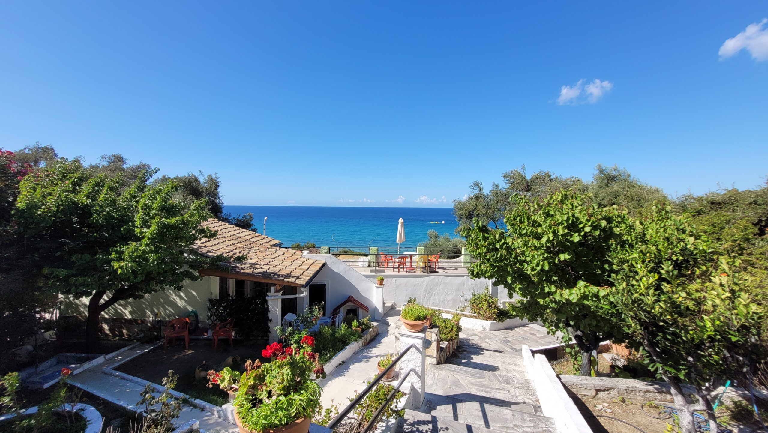 West-facing view towards Kontogialos beach from upper terrace