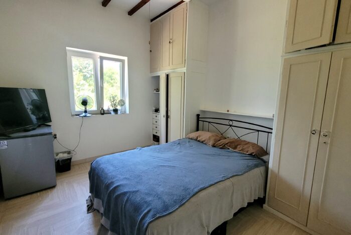 Spacious bedroom with natural light