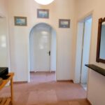 Hallway with access to every room of the house