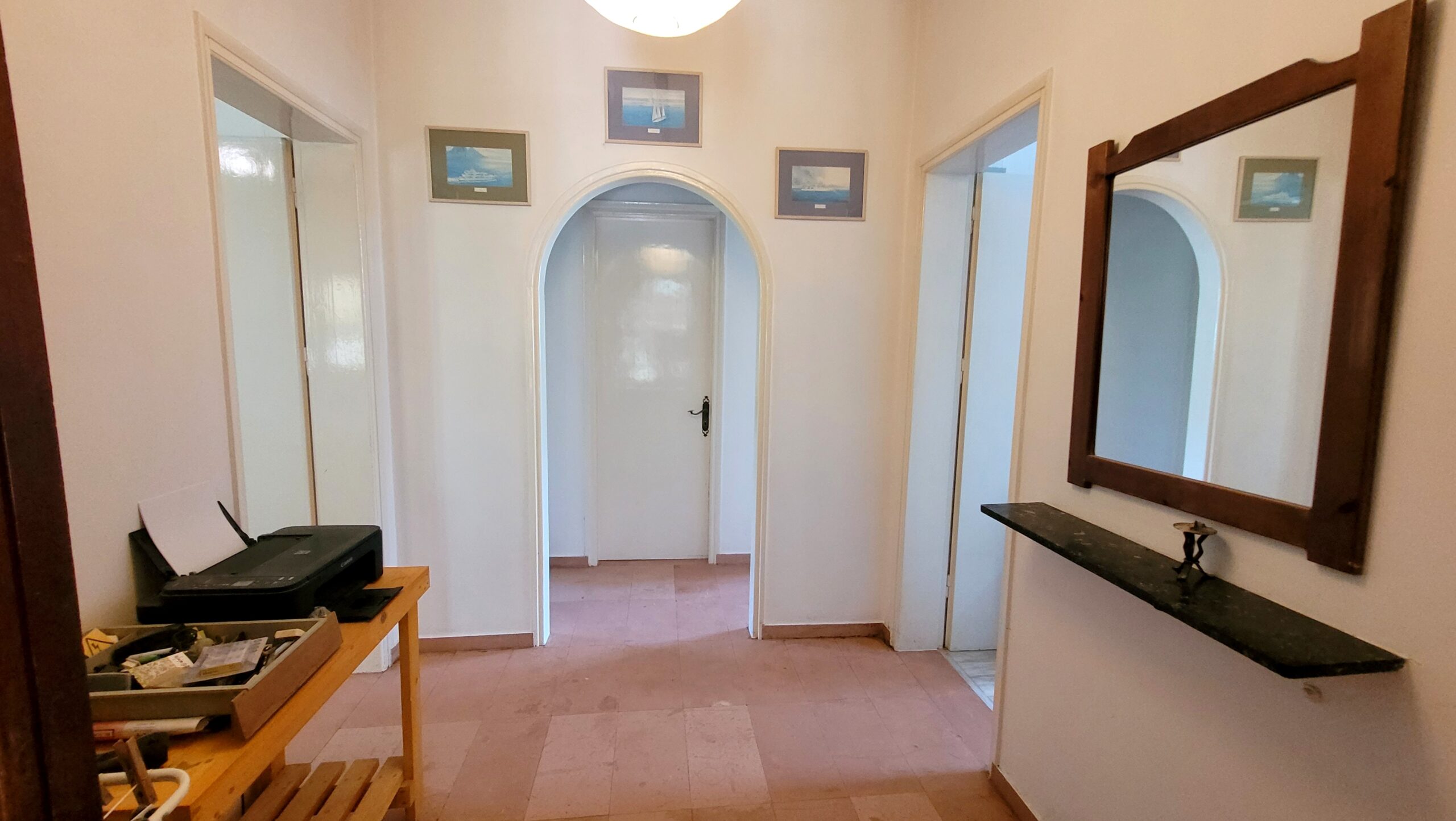 Hallway with access to every room of the house