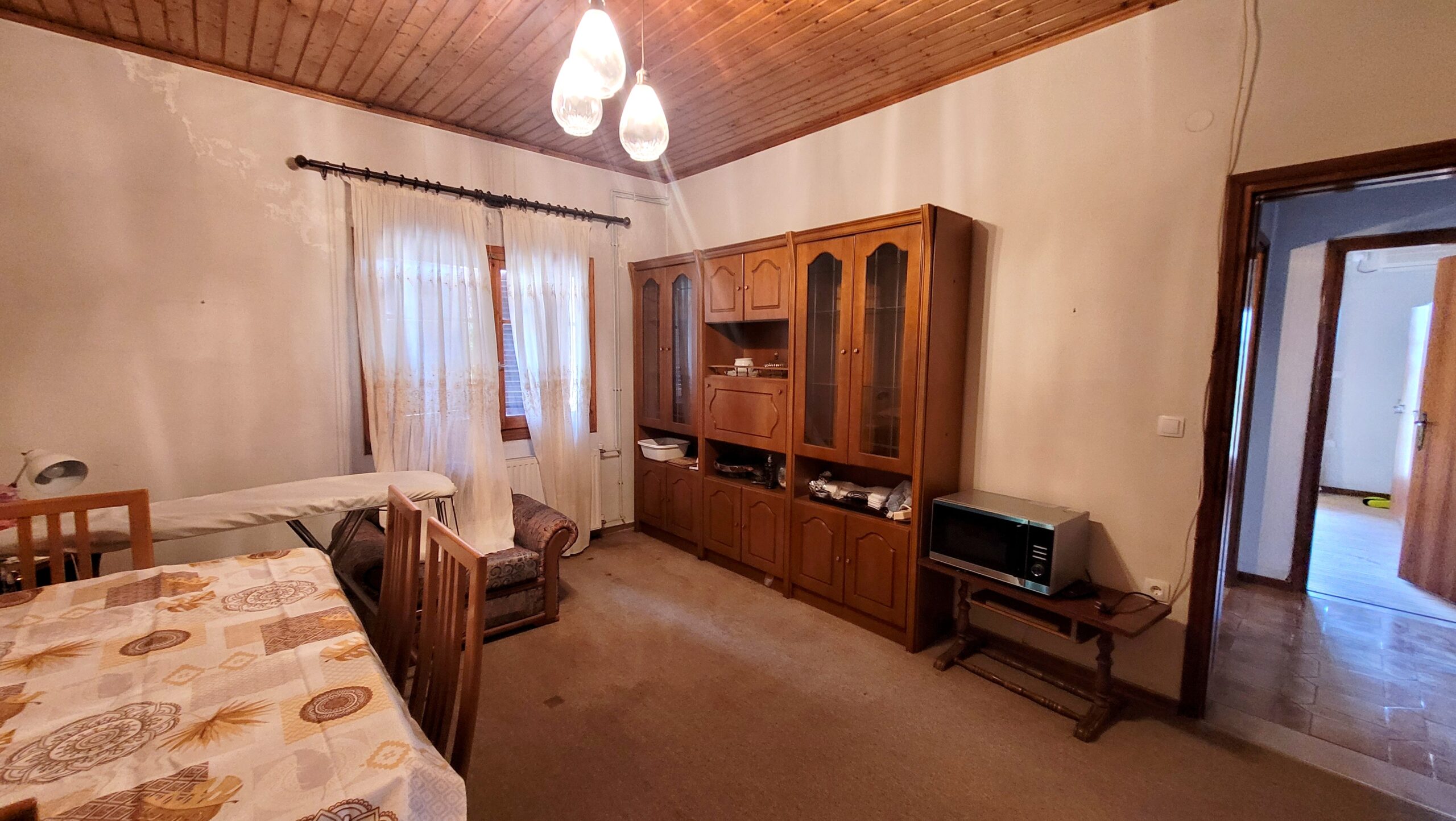 Living room with access to private balcony and garden