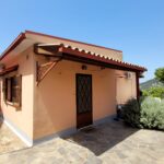 Entrance to detached house with paved outdoor space