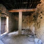 Ground floor interior with original stone walls