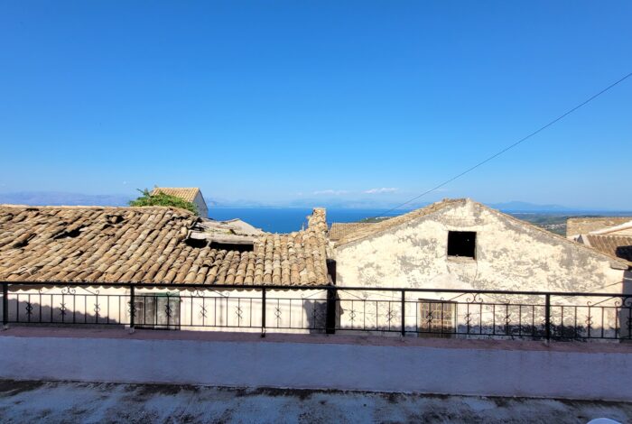 Sunny veranda ideal for outdoor relaxation with sea view