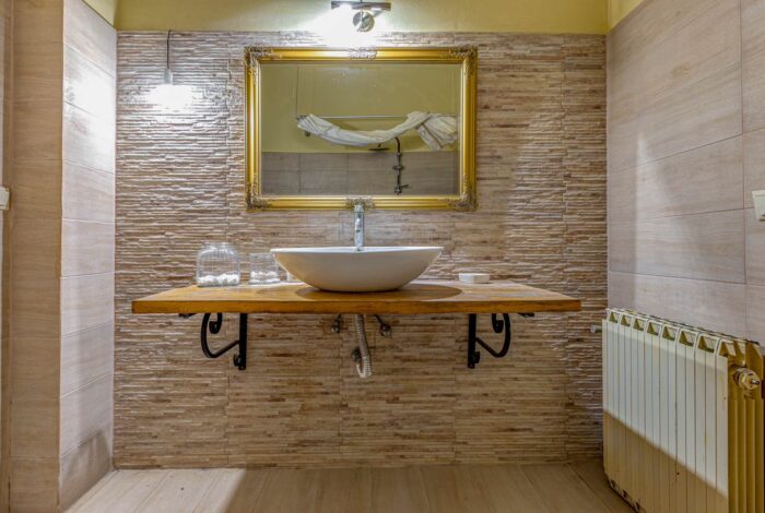 Bright bathroom with classic ceramic tiles and natural aesthetics
