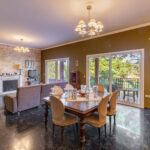 Ground floor living room with natural light and garden views