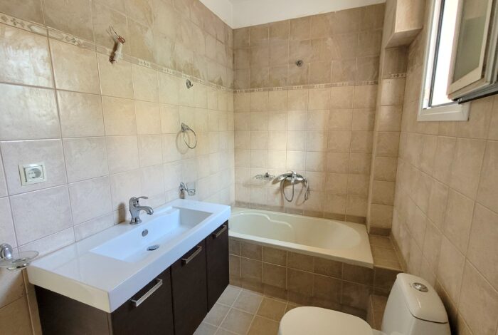 Full bathroom with bathtub on the upper floor