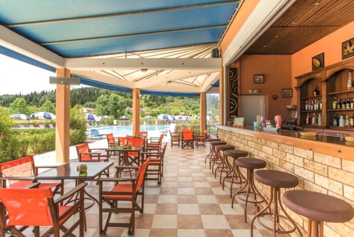 Pool bar at Corfu investment property with outdoor seating