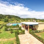 Outdoor areas with space for activities at Sidari apartment complex