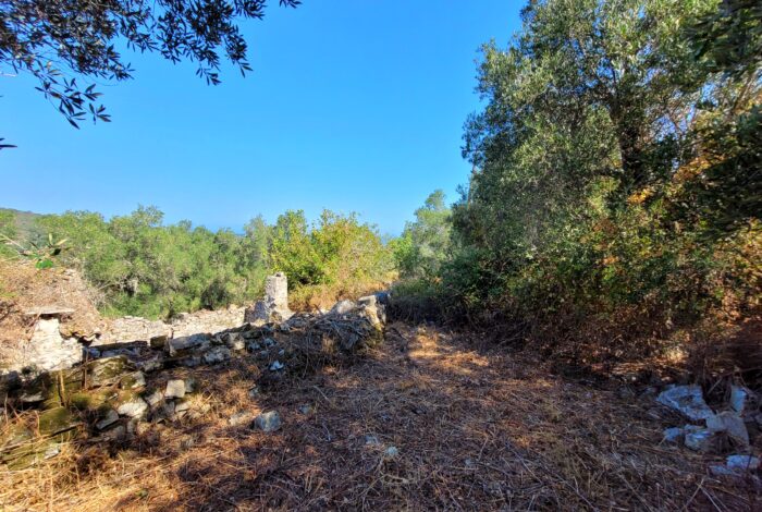 Spacious Paxos plot with stone house and extra building rights