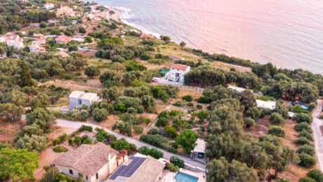 Aerial view of the villa for sale in Paramonas, Corfu with swimming pool and sea views