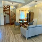 Comfortable sofa and seating area in fully furnished interior