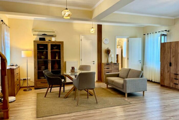 Fully furnished living room ideal for year-round living in Corfu