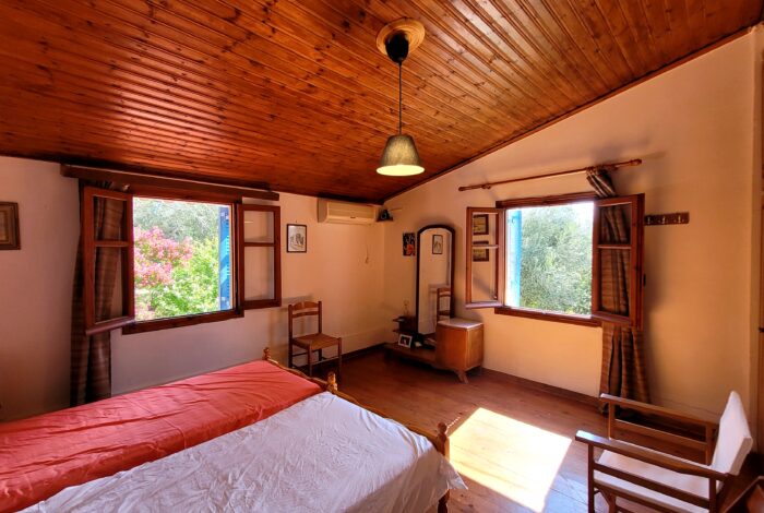 First floor bedroom with natural light in semi-detached maisonette South Corfu